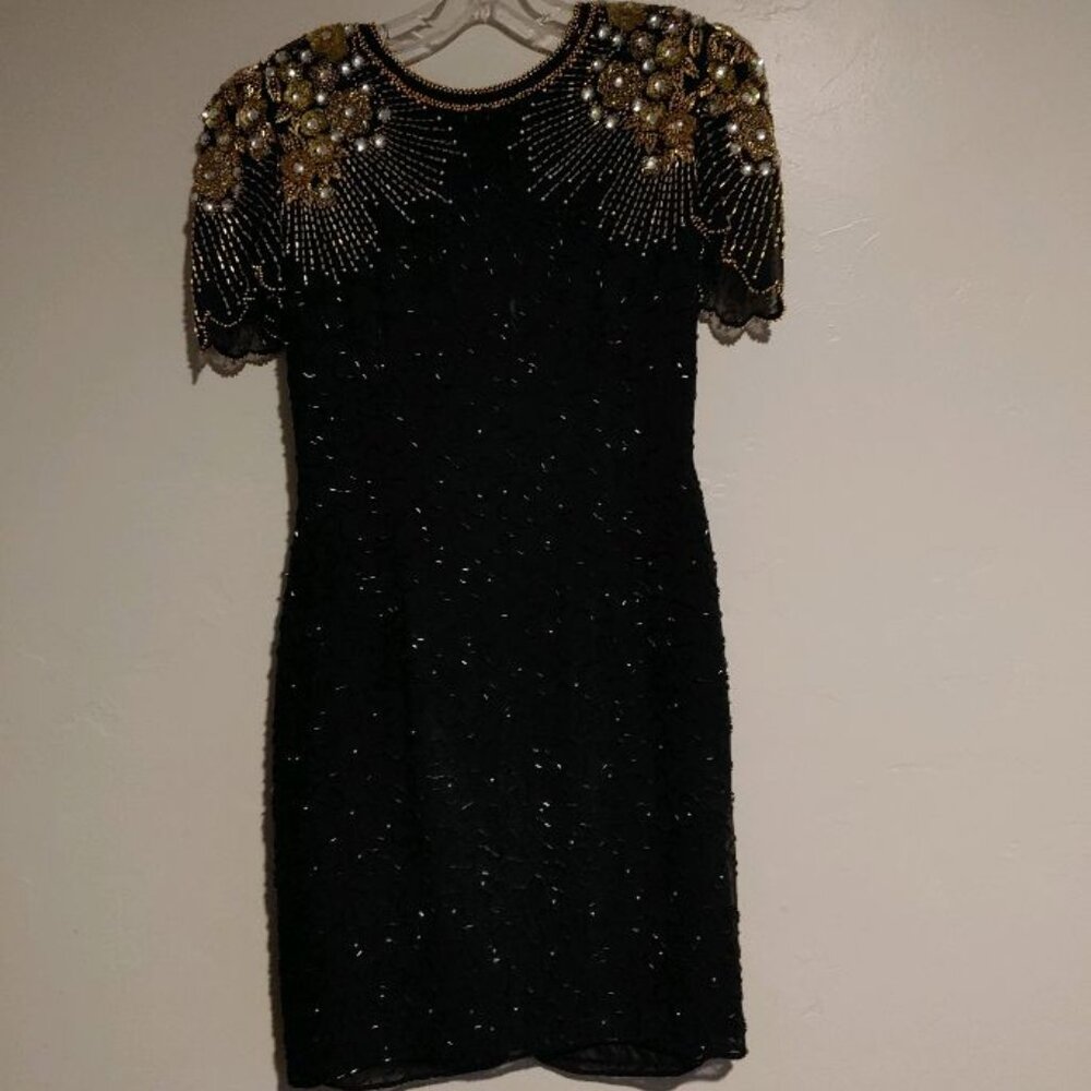 Black and gold sequin evening dress